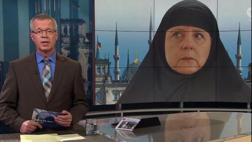 Merkel’e kara çarşaf giydirdiler