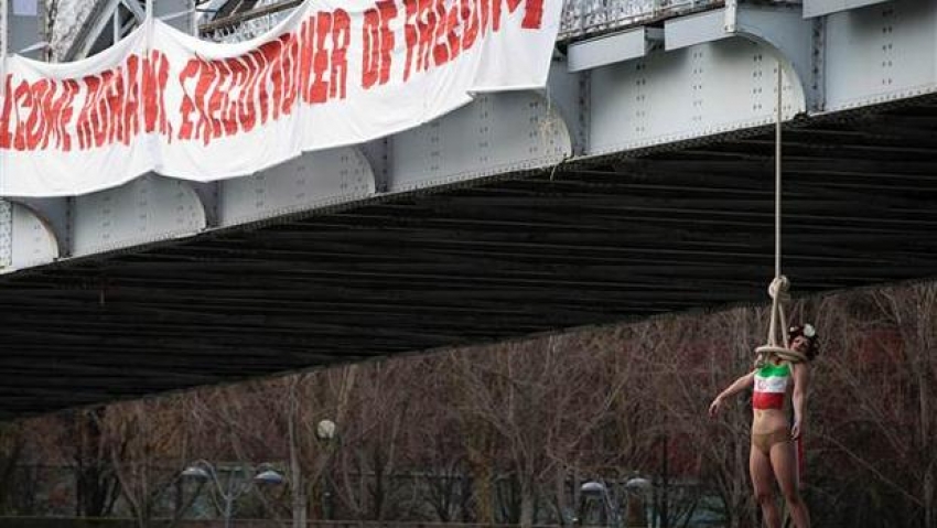 Ruhani'nin ziyaretinde FEMEN protestosu