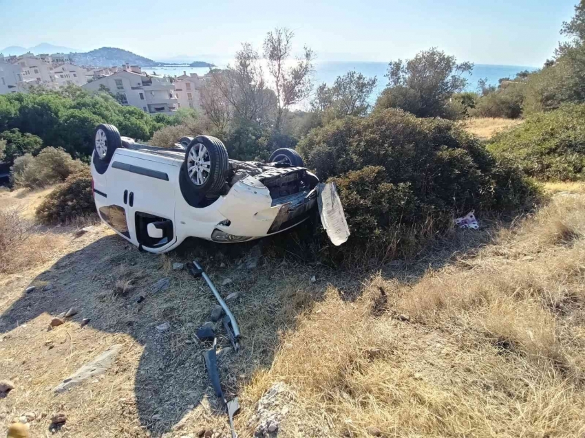 Takla atan araçtan yaralı olarak kurtuldu