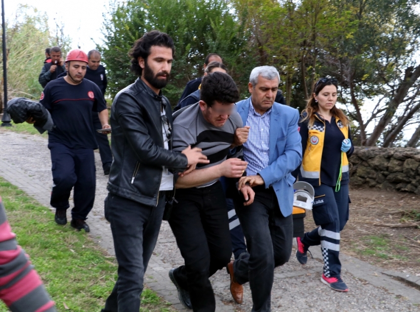 Falezlerde intihara kalkışan genci polis kurtardı