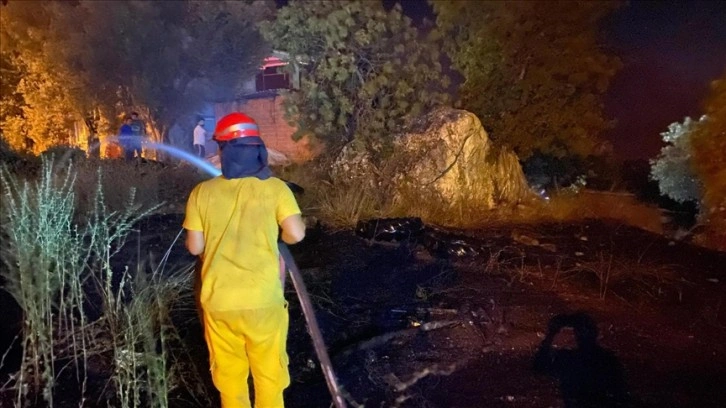 Muğla'nın Dalaman ilçesinde, ormanlık alanda çıkan yangın söndürüldü.