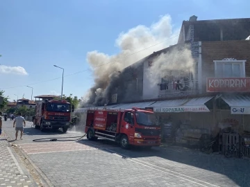 Markette çıkan yangın maddi hasara neden oldu
