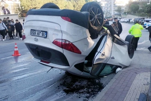 Bursa'da kafa kafaya çarpışan otomobillerden biri takla atarak durabildi