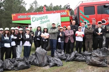 Vali Aslan öğrencilerle ormanda temizlik yaptı
