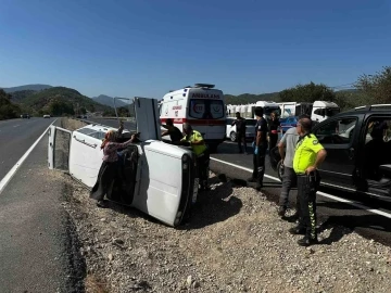 Yan yatan otomobilden yara almadan kurtuldular
